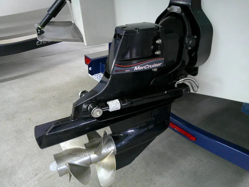Slide: The Image of MerCruiser outdrive on 2021 Crownline 255 SS boat, featuring dual propellers. - 23
