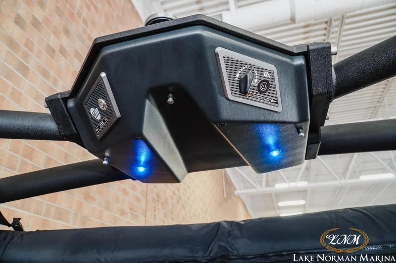 Slide: The Image of 2023 Malibu 26 LSV boat speaker system with blue LED lights at Lake Norman Marina. - 30