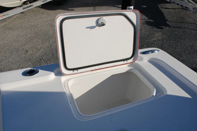 Slide: The Image of Open storage compartment on 2024 Sea Pro 250 Bay boat. - 15