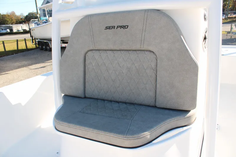 Slide: The Image of 2024 Sea Pro 250 Bay boat seat with gray upholstery and diamond stitching. - 31