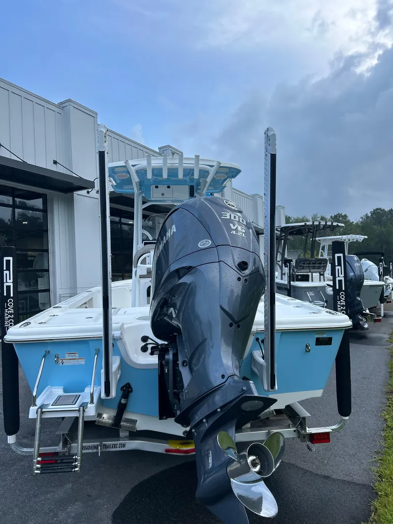 Slide: The Image of 2024 Sea Pro 250 Bay boat with Yamaha 300 V6 engine, parked outside dealership. - 40