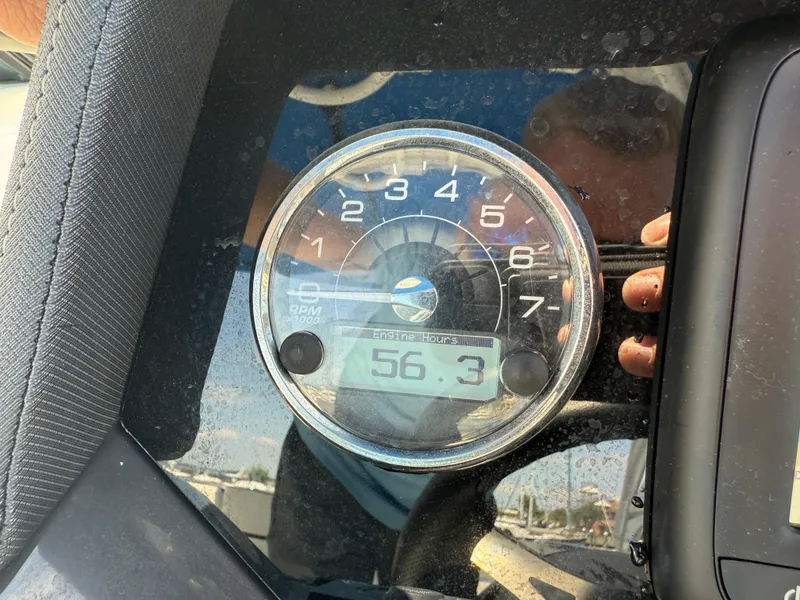 Slide: The Image of Close-up of a 2018 Monterey M-45 tachometer displaying 56.3 hours. - 15