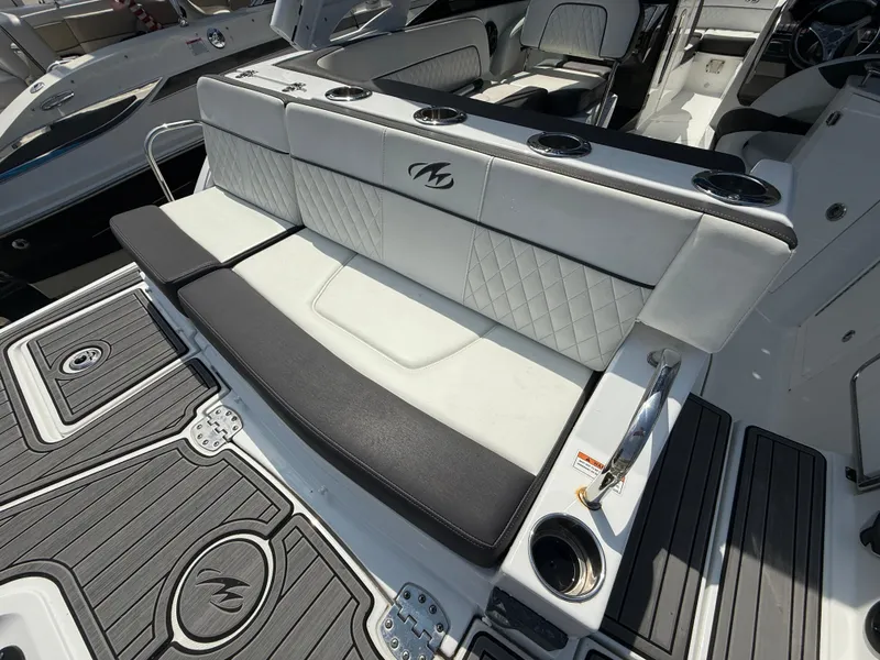 Slide: The Image of Luxury seating on a 2018 Monterey M-45 boat with stylish upholstery and cup holders. - 5