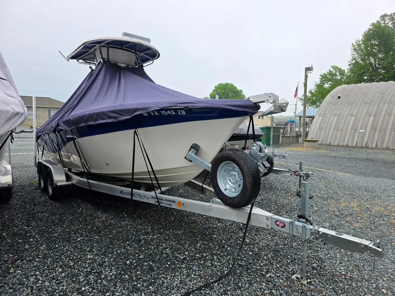 Slide: The Image of 2023 Sea Chaser 22 HFC boat on trailer, covered, parked outdoors. - 7