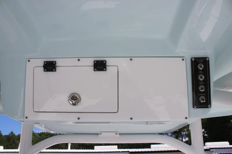 Slide: The Image of 2025 Sea Pro 222 boat console with storage compartment and control panel. - 33