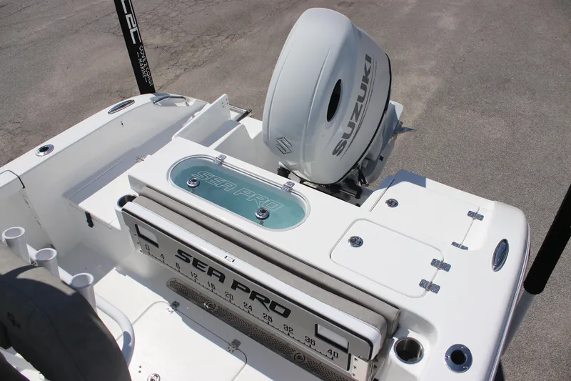 Slide: The Image of 2025 Sea Pro 222 boat with Suzuki engine, featuring a sleek white design and modern amenities. - 7