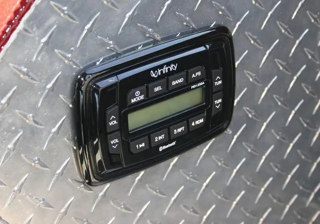 Slide: The Image of Infinity audio system on 2023 Thunder Jet 185 Luxor's diamond plate surface. - 11