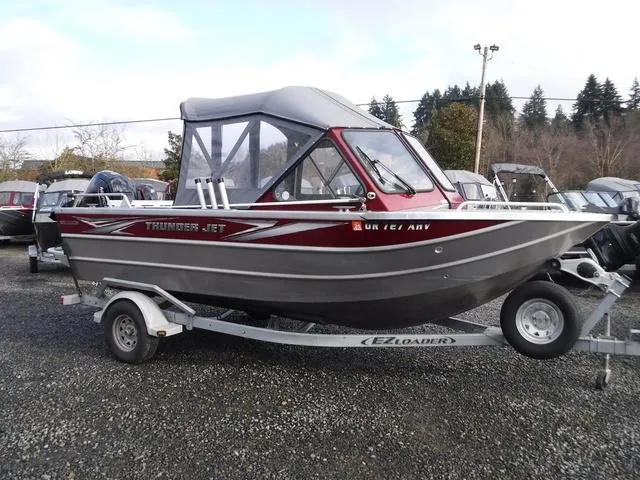 Slide: The Image of 2023 Thunder Jet 185 Luxor boat on trailer, parked outdoors. - 5