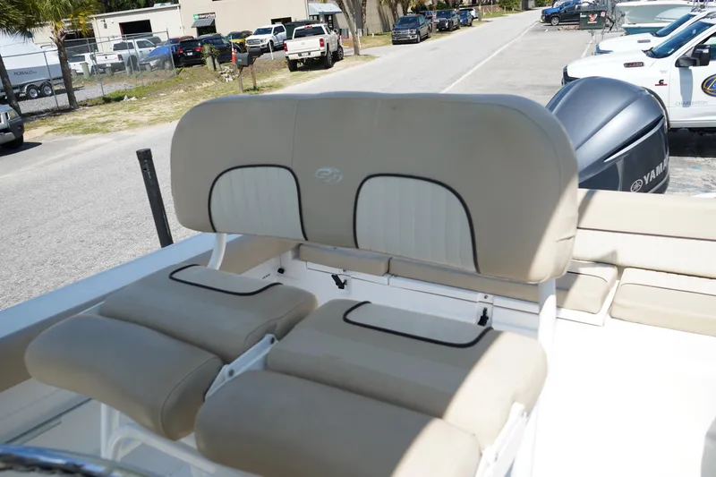 Slide: The Image of 2016 Sea Fox 246 Commander boat seats with beige upholstery, parked in a lot. - 20