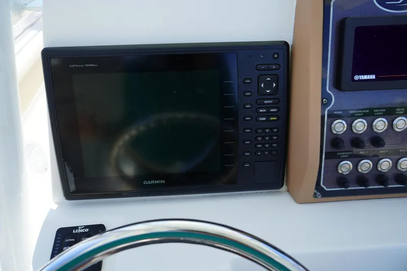 Slide: The Image of Garmin GPS display on 2016 Sea Fox 246 Commander boat dashboard. - 24