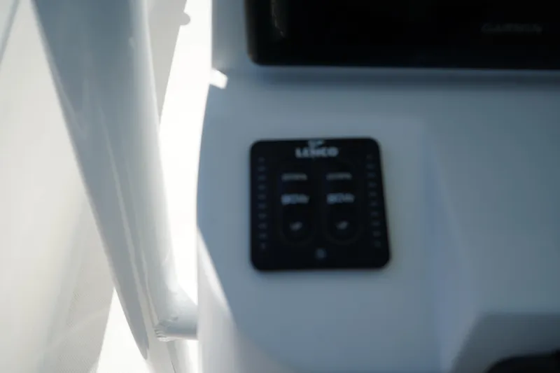 Slide: The Image of Control panel on a 2016 Sea Fox 246 Commander boat dashboard. - 29