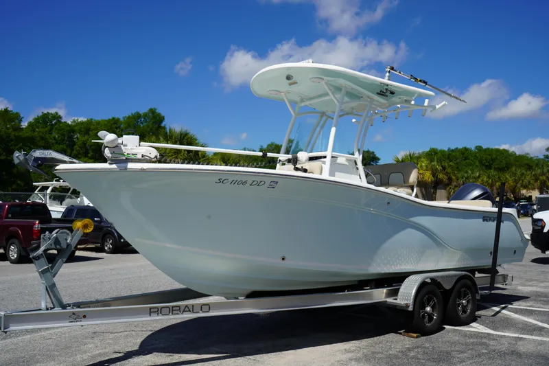 Slide: The Image of 2016 Sea Fox 246 Commander boat on Robalo trailer in parking lot. - 3