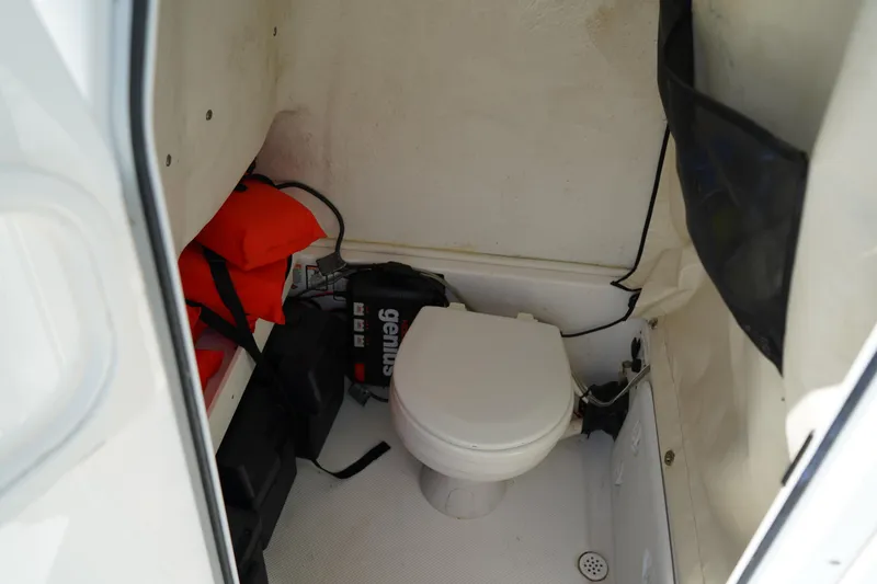Slide: The Image of Interior of 2016 Sea Fox 246 Commander boat with toilet and safety equipment. - 37
