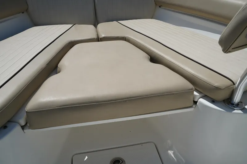 Slide: The Image of 2016 Sea Fox 246 Commander boat interior with beige cushioned seating. - 43