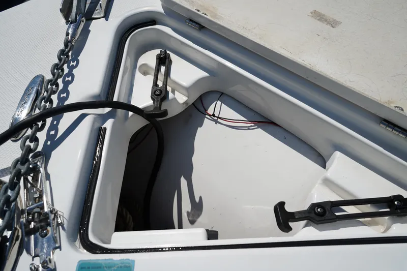 Slide: The Image of Open storage compartment on a 2016 Sea Fox 246 Commander boat. - 48