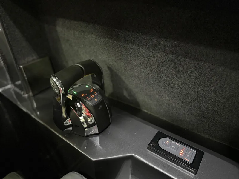 Slide: The Image of Mercury Marine DTS controls on a 2020 Extreme Boats 795 Walk Around - 16