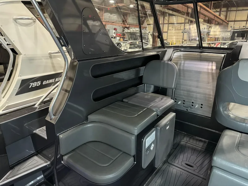 Slide: The Image of Interior of 2020 Extreme Boats 795 Walk Around, featuring seating and modern design. - 8