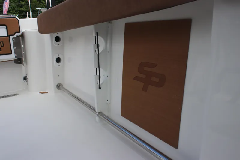 Slide: The Image of 2025 Sea Pro 222 boat interior with logo and seating area. - 14