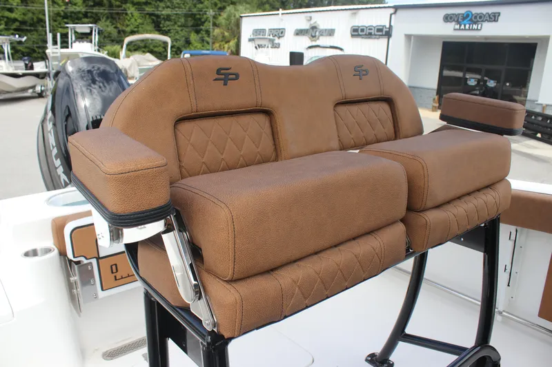Slide: The Image of 2025 Sea Pro 222 boat seat with brown leather upholstery and diamond stitching. - 15
