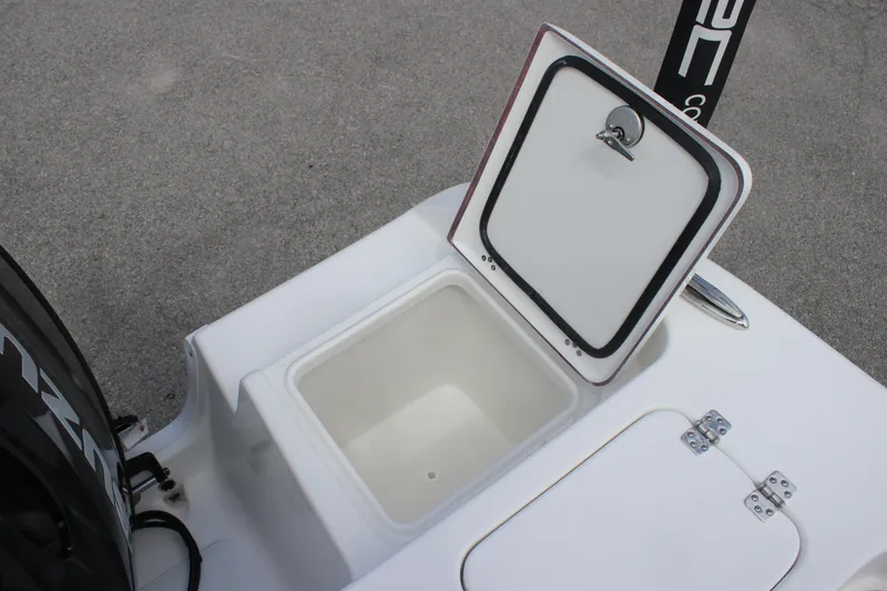 Slide: The Image of 2025 Sea Pro 222 boat storage compartment with open lid, showcasing interior space. - 7