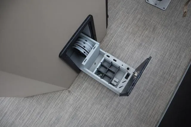 Slide: The Image of 2017 Lowe SF 232 boat storage compartment with open hatch on deck. - 19