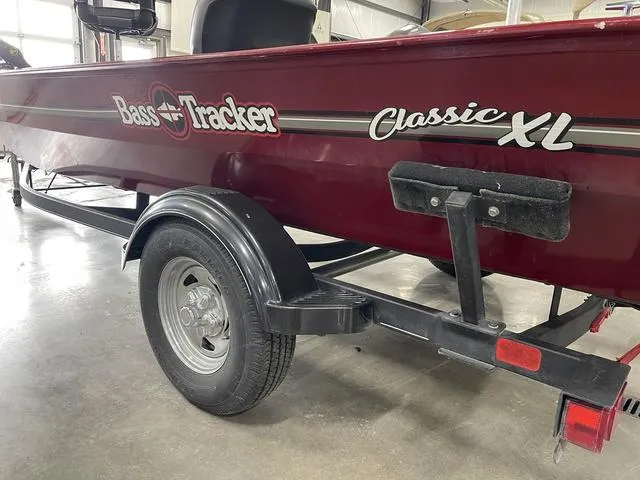 Slide: The Image of 2020 Tracker BASS TRACKER® Classic XL boat on trailer in garage. - 10