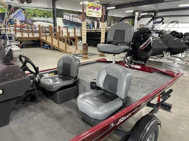 Slide: The Image of 2020 Tracker BASS TRACKER® Classic XL boat with seating and Mercury engine in showroom. - 12
