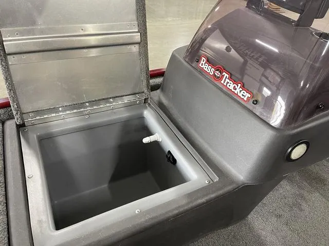 Slide: The Image of 2020 Tracker BASS TRACKER® Classic XL boat storage compartment with open lid. - 16