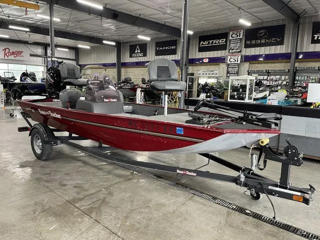 Slide: The Image of 2020 Tracker BASS TRACKER® Classic XL boat in showroom, red exterior, on trailer. - 3