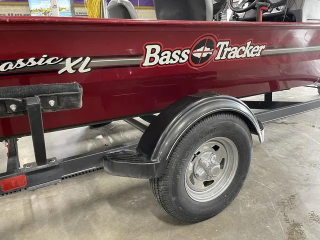 Slide: The Image of 2020 Tracker BASS TRACKER® Classic XL boat on trailer, red exterior, close-up view. - 6