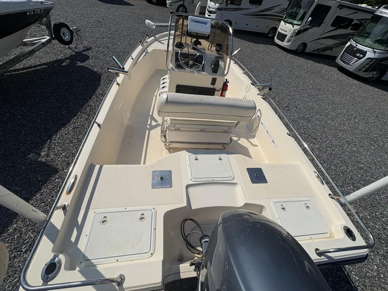 Slide: The Image of 2004 Key West 186 Bay Reef boat with center console and outboard motor. - 10
