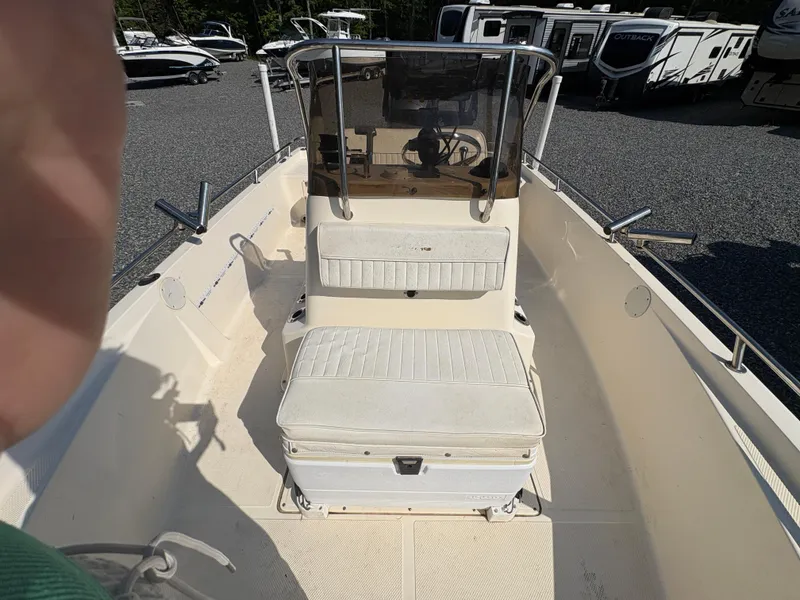 Slide: The Image of 2004 Key West 186 Bay Reef boat interior with seating and console. - 16