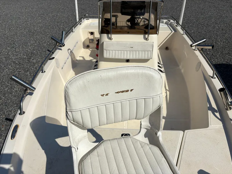 Slide: The Image of 2004 Key West 186 Bay Reef boat interior with seating and console. - 20