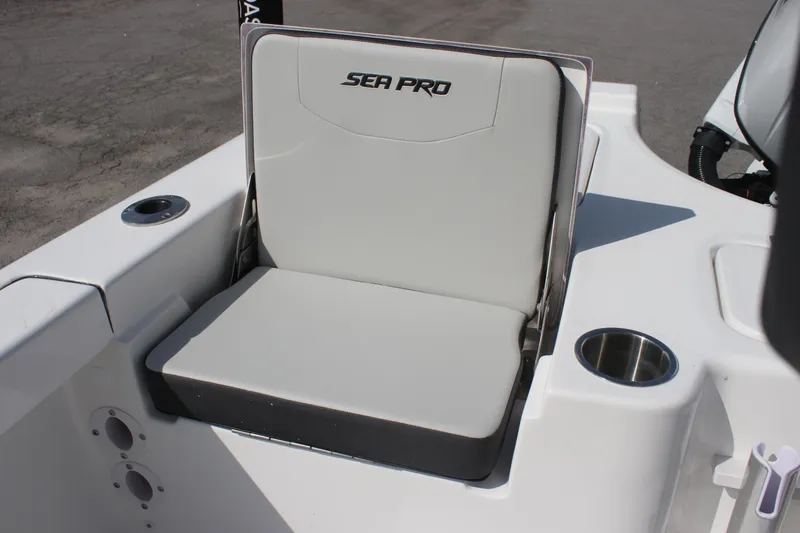 Slide: The Image of 2025 Sea Pro 230 Bay boat seat with cup holder, showcasing sleek design and comfort. - 10