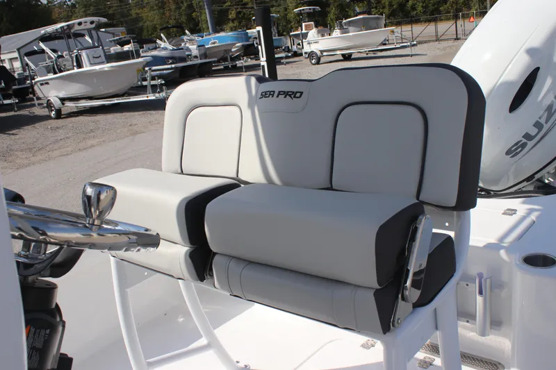 Slide: The Image of 2025 Sea Pro 230 Bay boat seating with sleek design and comfortable cushions. - 19