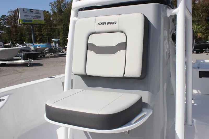 Slide: The Image of 2025 Sea Pro 230 Bay boat seat with sleek design and comfortable padding. - 22
