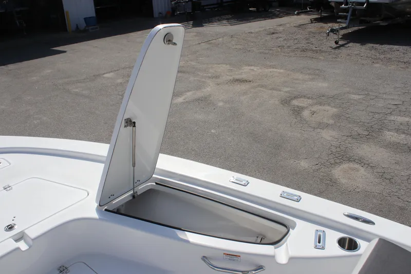 Slide: The Image of Open storage compartment on 2025 Sea Pro 230 Bay boat. - 24