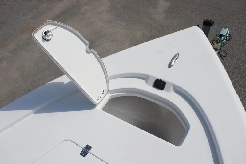 Slide: The Image of Open storage compartment on 2025 Sea Pro 230 Bay boat deck. - 26