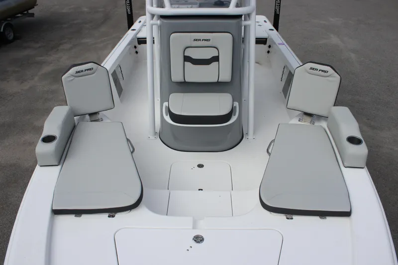 Slide: The Image of 2025 Sea Pro 230 Bay boat interior with cushioned seating and modern design. - 7