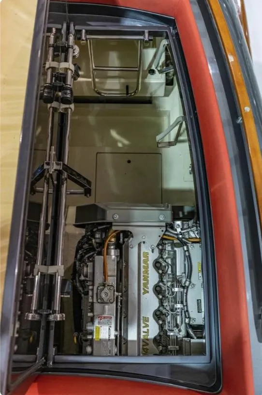 Slide: The Image of Engine compartment of a 2013 Riva Aquariva 33 boat, showcasing detailed machinery. - 41