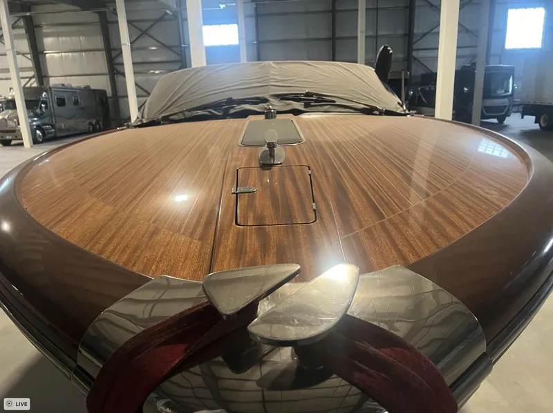 Slide: The Image of 2013 Riva Aquariva 33 with polished wooden deck in a storage facility. - 19