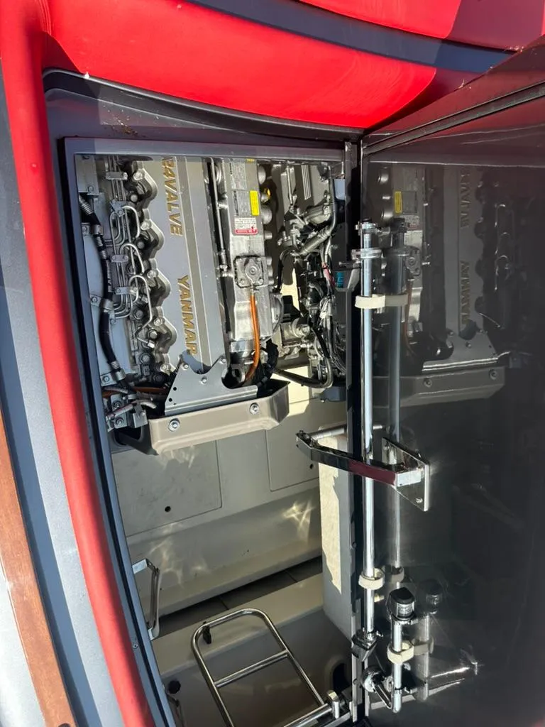 Slide: The Image of Engine compartment of a 2013 Riva Aquariva 33, showcasing Yanmar engines. - 42