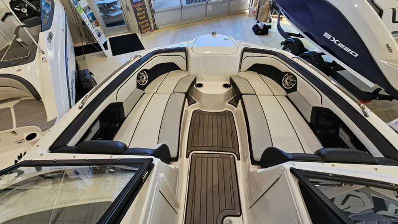 Slide: The Image of 2017 Yamaha Boats 212X interior with sleek seating and modern design. - 14