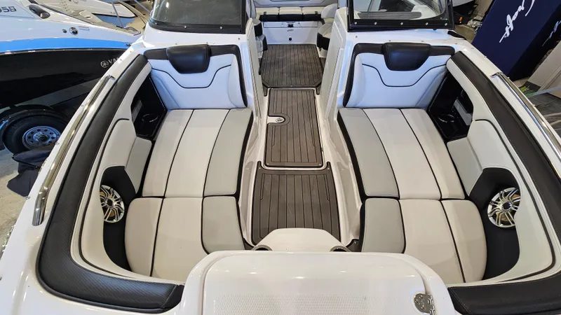 Slide: The Image of 2017 Yamaha Boats 212X interior with sleek seating and modern design. - 15