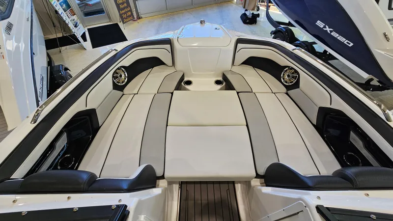 Slide: The Image of 2017 Yamaha Boats 212X interior with sleek seating and modern design. - 16