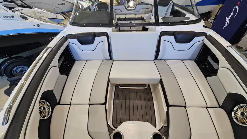 Slide: The Image of 2017 Yamaha Boats 212X interior with spacious seating and modern design. - 17