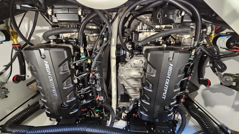 Slide: The Image of 2017 Yamaha Boats 212X engine compartment with dual high-output engines. - 20