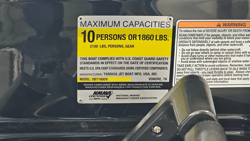 Slide: The Image of Yamaha Boats 2017 212X capacity label, maximum 10 persons or 1860 lbs, safety compliance details. - 22