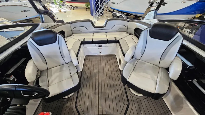 Slide: The Image of 2017 Yamaha Boats 212X interior with sleek seating and modern design. - 6