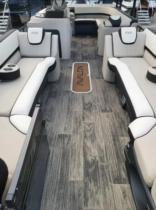 Slide: The Image of 2024 Avalon Catalina Entertainer Funship interior with luxurious seating and stylish flooring. - 18
